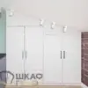 Распашной встроенный шкаф вписанный под скошенный потолок в Минске